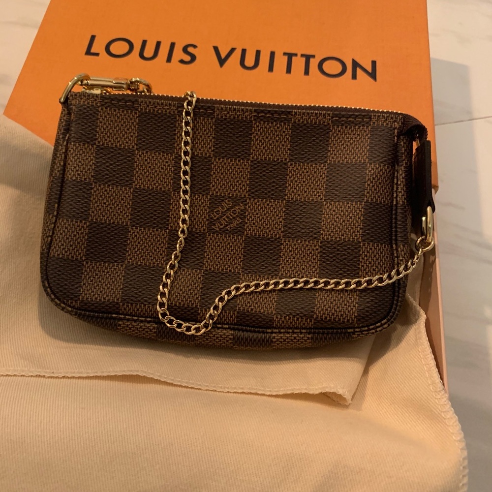Authentic Louis Vuitton pochette mini damier ebene